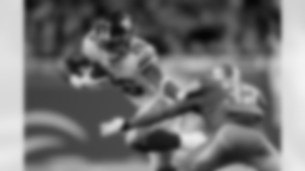 New York Giants running back Saquon Barkley (26) breaks the tackle of Detroit Lions defensive back Tavon Wilson (32) during an NFL football game in Detroit, Sunday, Oct. 27, 2019. (AP Photo/Paul Sancya)