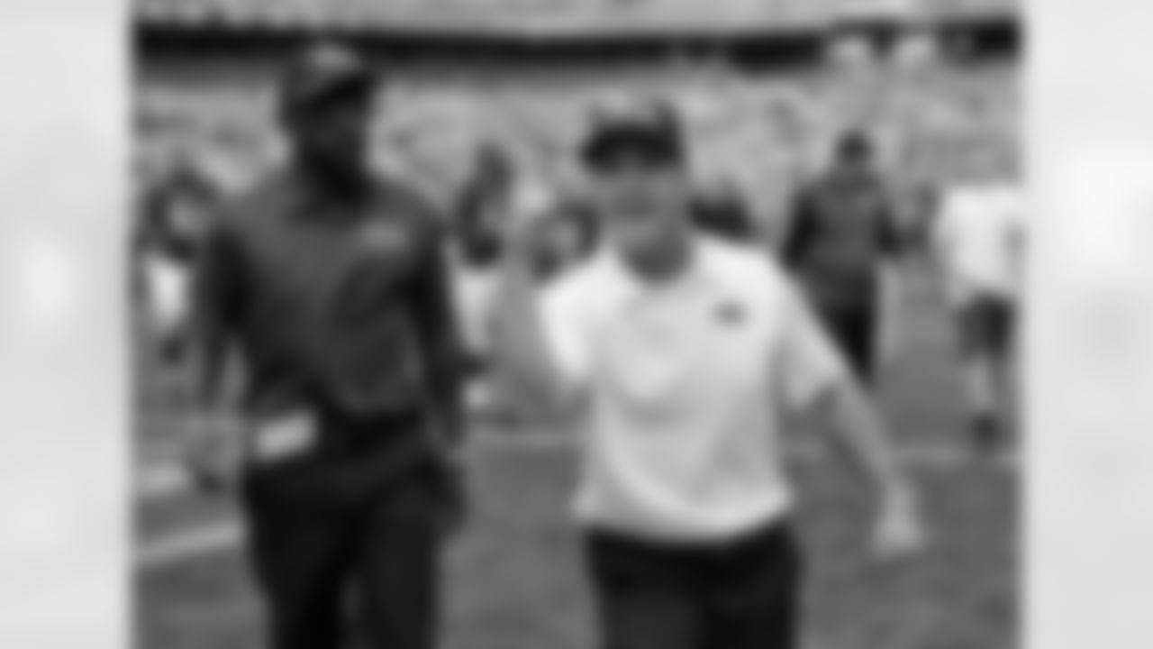 Baltimore Ravens head coach John Harbaugh celebrates after a 23-21 win over the Cleveland Browns inane  NFL football game Sunday, Sept. 21, 2014, in Cleveland. (AP Photo/David Richard)