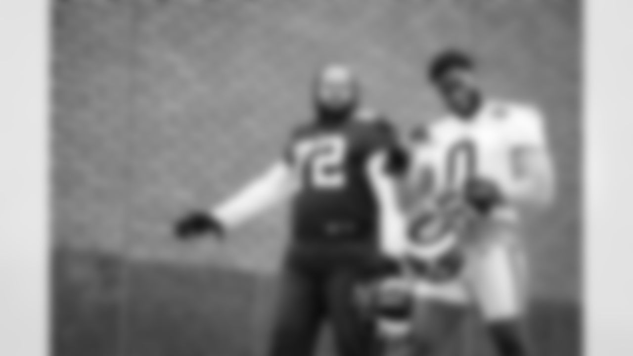 T Jermaine Eluemunor (72) and OLB Brian Burns (0)