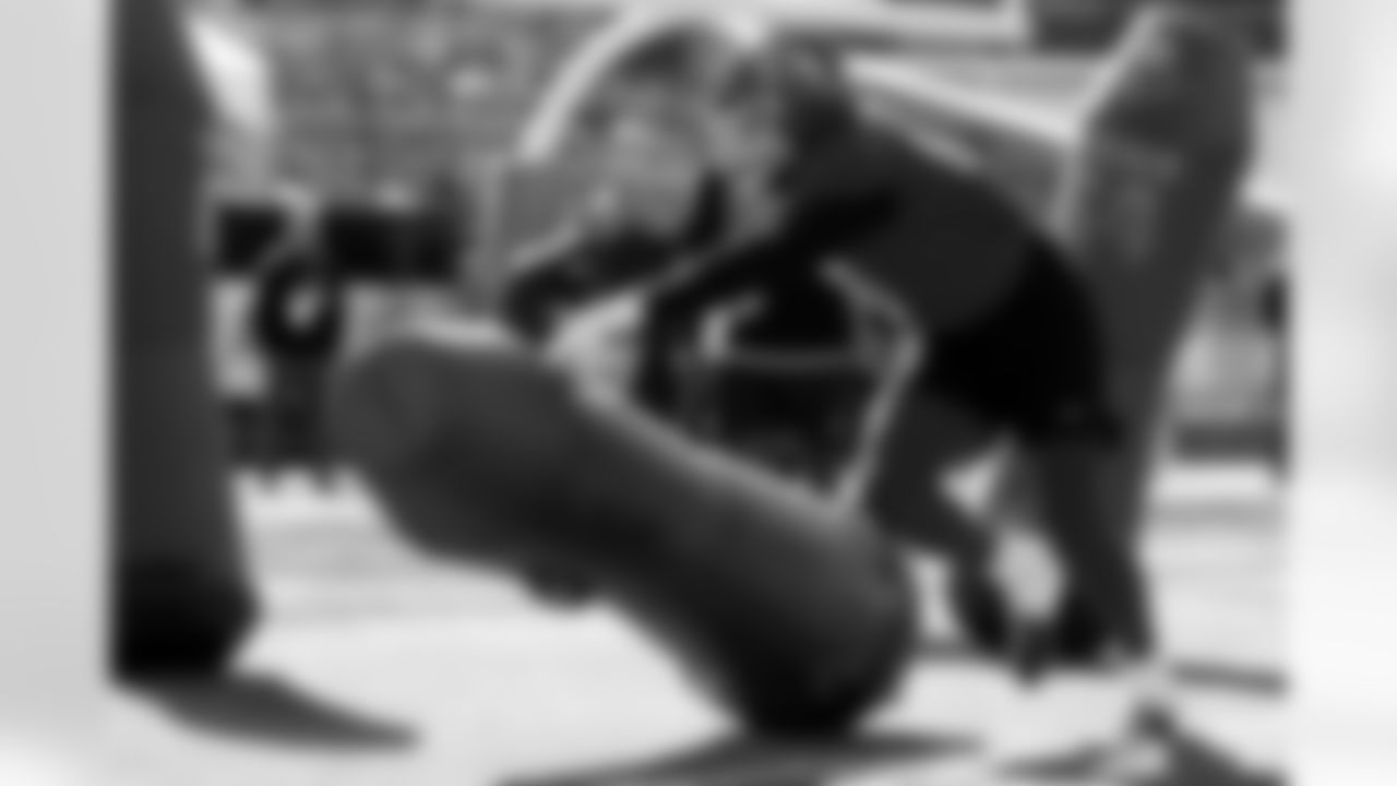 National Team defensive end Logan Fano (50), of Utah, runs through drills during practice for the Senior Bowl NCAA college football game Tuesday, Jan. 27, 2026, in Mobile, Ala. (AP Photo/Butch Dill)