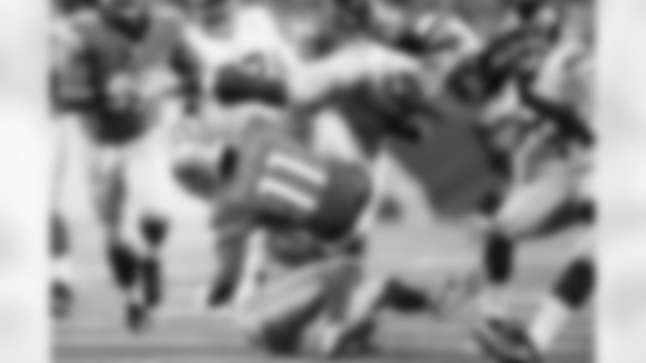 Detroit Lions wide receiver Kevin Ogletree (11) is tackled by New York Giants free safety Ryan Mundy (21) and middle linebacker Jon Beason (52) during an NFL football game at Ford Field in Detroit, Sunday, Dec. 22, 2013. (AP Photo/Rick Osentoski)