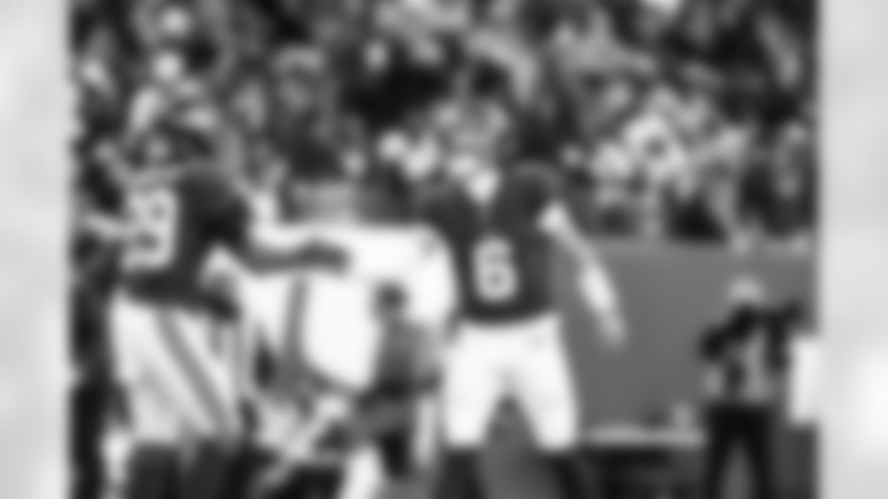 RB Tyrone Tracy Jr. (29), QB Jaxson Dart (6)