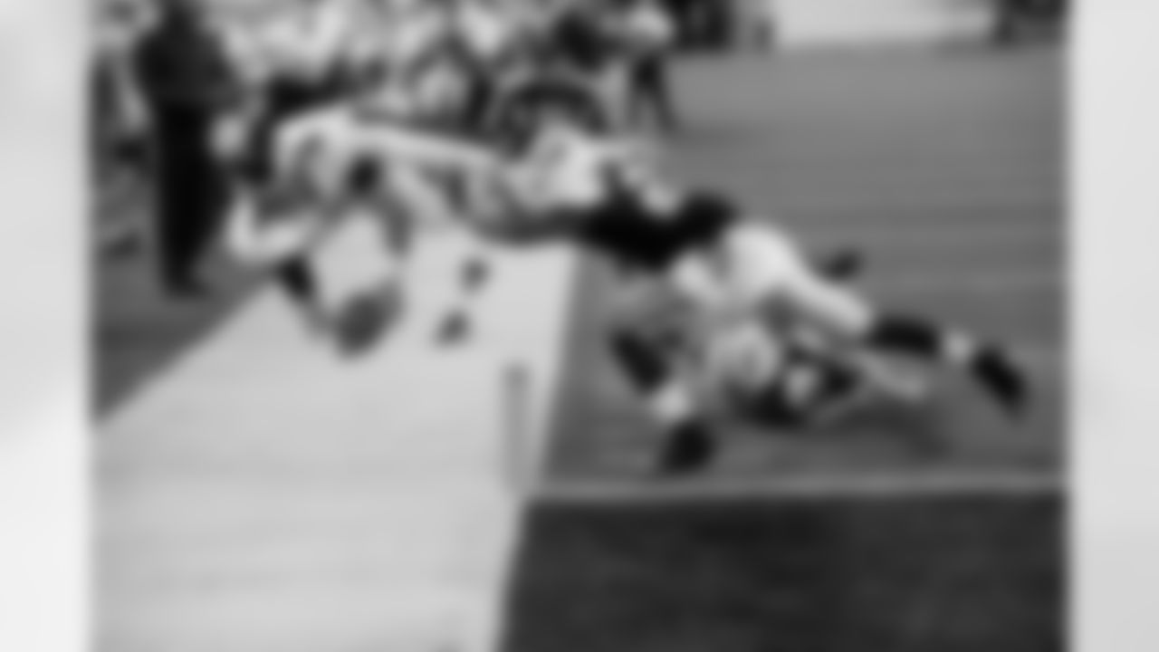 Philadelphia Eagles' Mike Kafka, left, is forced out of bounds just before the end zone by New York Jets' Emanuel Cook, right, and Davon Morgan during the third quarter of an NFL preseason football game, Thursday, Sept. 1, 2011, in East Rutherford, N.J. (AP Photo/Henny Ray Abrams)