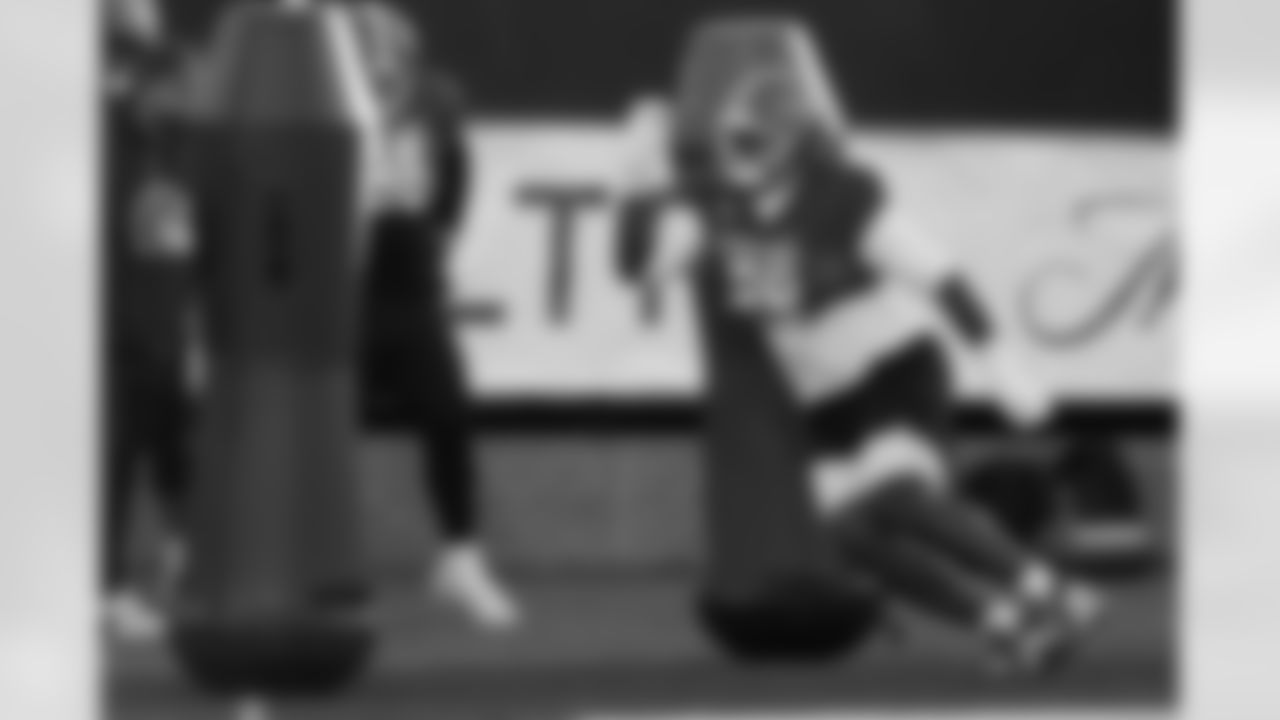 American Team defensive tackle Caleb Banks (88), of Florida, runs through drills during practice for the Senior Bowl NCAA college football game Tuesday, Jan. 27, 2026, in Mobile, Ala. (AP Photo/Butch Dill)