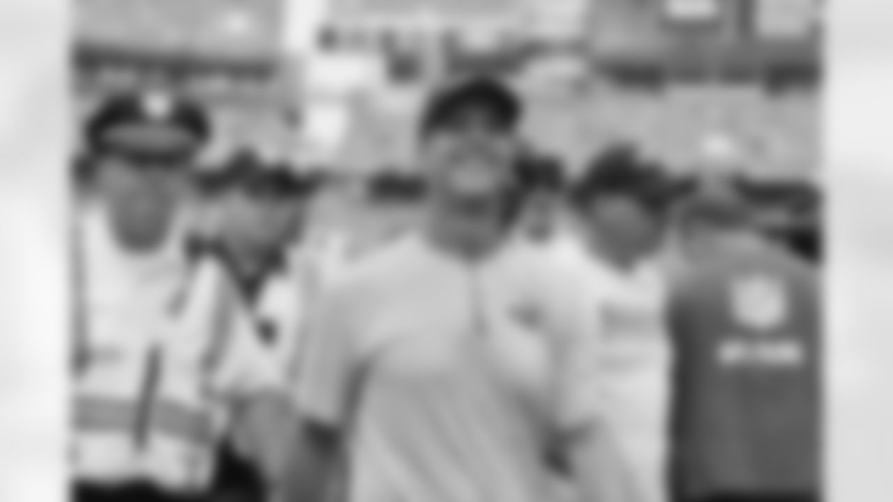 Baltimore Ravens head coach John Harbaugh smiles as he walks off the field after an NFL football game against the Cleveland Browns, Sunday, Sept. 18, 2016, in Cleveland. The Ravens won 25-20. (AP Photo/David Richard)