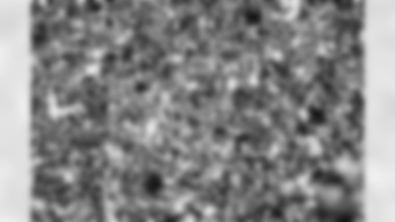 Fans look on during the first quarter of an NFL football game between the Detroit Lions and the New York Giants at New Meadowlands Stadium Sunday, Oct. 17, 2010, in East Rutherford, N.J. (AP Photo/Tim Larsen)