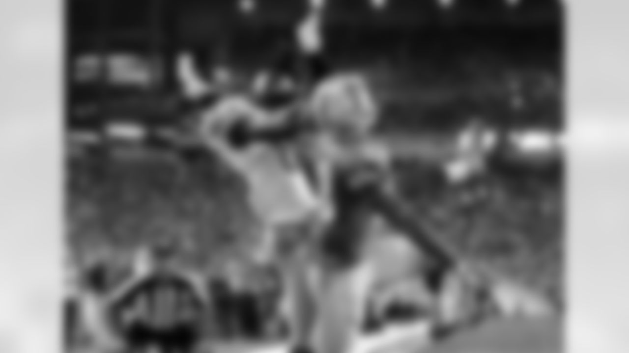 Detroit Lions cornerback Darius Slay (23) tries to break up a pass intended for New York Giants wide receiver Corey Washington (88) during a NFL football game in Detroit, Friday, Sept. 12, 2014. The pass was incomplete. (AP Photo/Paul Sancya)