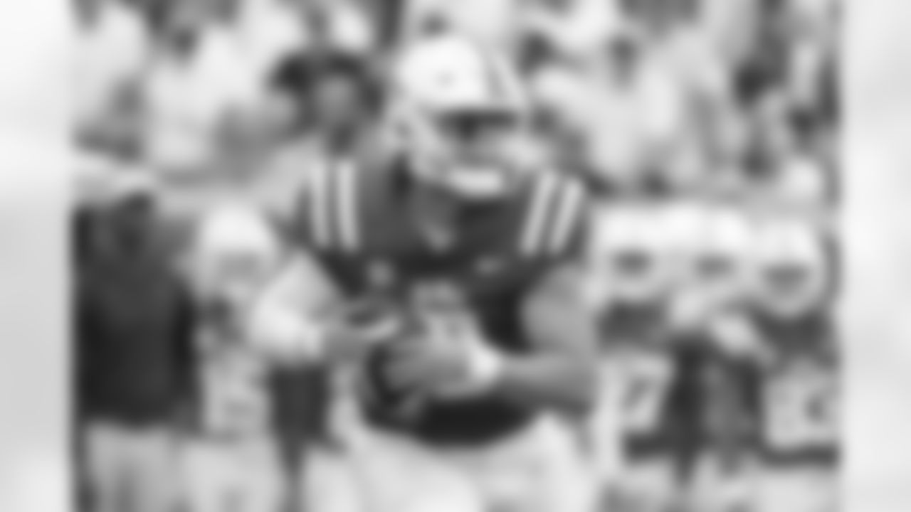 Mississippi quarterback Jaxson Dart (2) looks to pass during the first half of an NCAA college football game against Mercer in Oxford, Miss., Saturday, Sept. 2, 2023. (AP Photo/Thomas Graning)