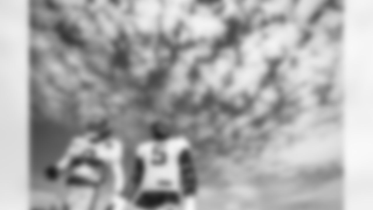 OLB Kayvon Thibodeaux (5) and OLB Brian Burns (0)