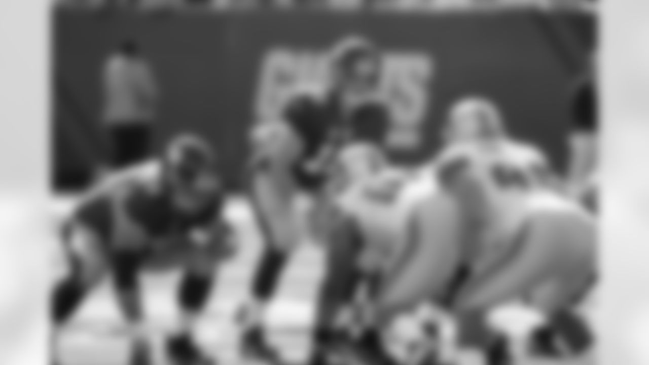 New York Giants quarterback Eli Manning (10) looks over the defense during the second quarter of an NFL football game between the Detroit Lions and the New York Giants at New Meadowlands Stadium Sunday, Oct. 17, 2010, in East Rutherford, N.J. (AP Photo/Seth Wenig)