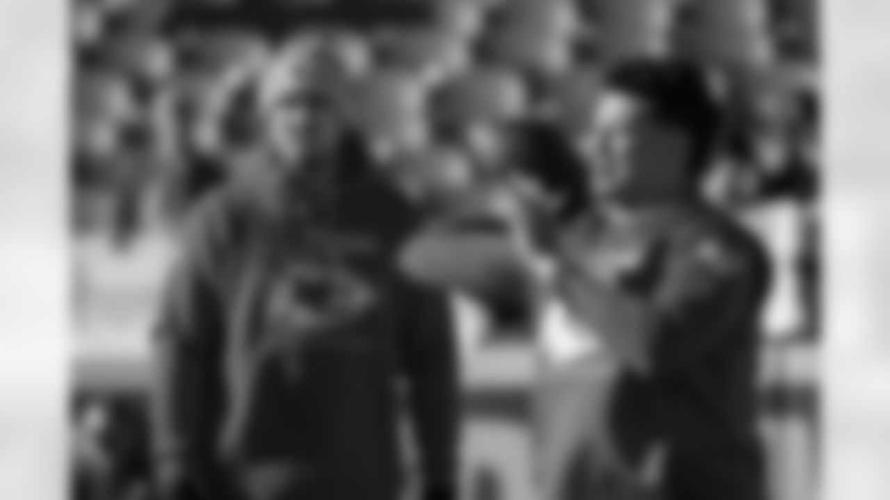 Kansas City Chiefs quarterbacks coach Mike Kafka watches Patrick Mahomes during pre-game warmups before an NFL football game against the Las Vegas Raiders, Sunday, Dec. 12, 2021 in Kansas City, Mo. (AP Photo/Reed Hoffmann)