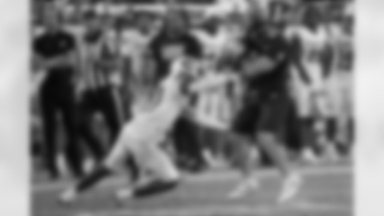 Arizona State running back Cam Skattebo (4) makes Kansas safety Taylor Davis (27) miss during the second half of an NCAA college football game Saturday, Oct. 5, 2024, in Tempe, Ariz. (AP Photo/Darryl Webb)