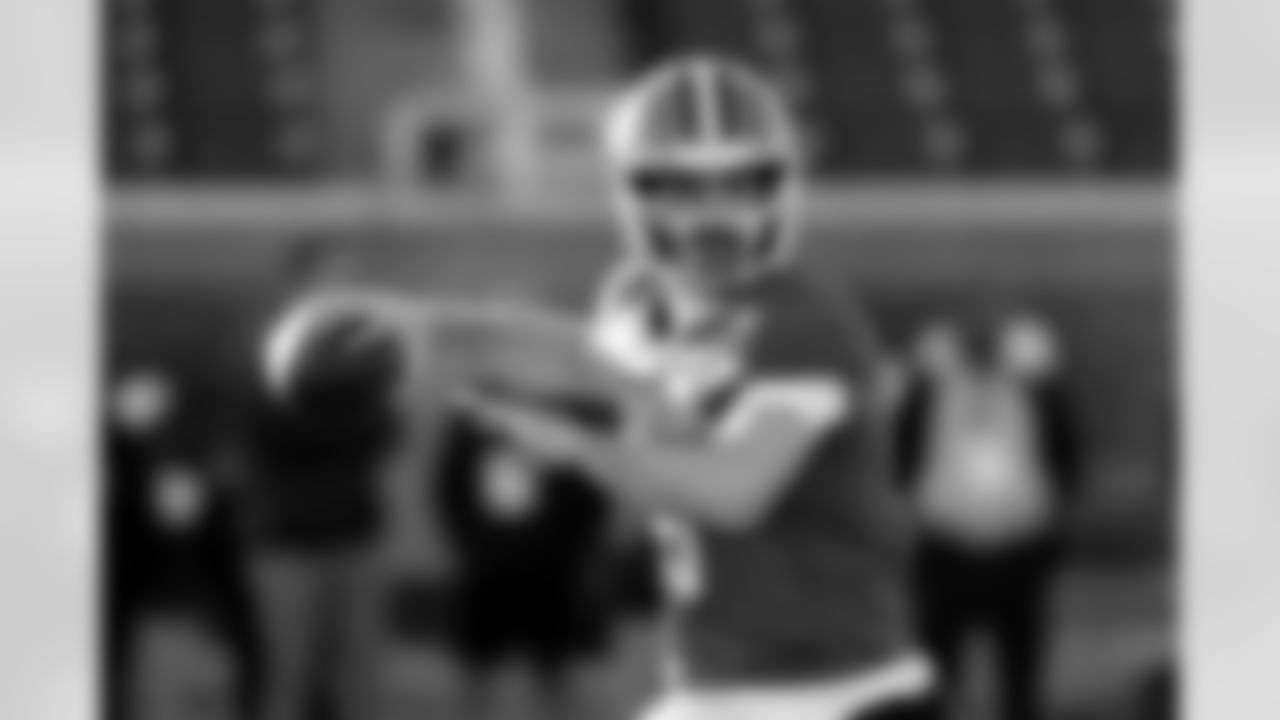 American Team quarterback Luke Altmyer (9), of Illinois, runs through drills during practice for the Senior Bowl NCAA college football game Tuesday, Jan. 27, 2026, in Mobile, Ala. (AP Photo/Butch Dill)