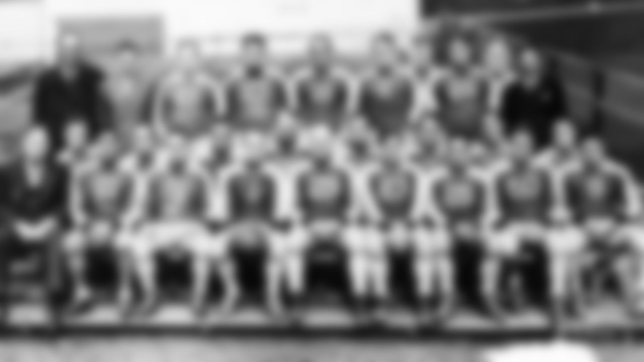 The 1934 N.Y. Giants pose for a team photo. The Giants won the 1934 NFL Championship Game over the Chicago Bears in what's known as "The Sneakers Game" after their players switched from cleats to sneakers to help with their footing in their upset win. (AP Photo/Pro Football Hall of Fame)