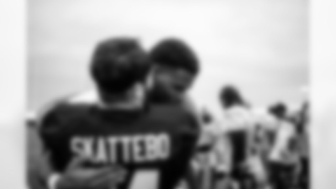 RB Cam Skattebo (44) and OLB Abdul Carter (51)