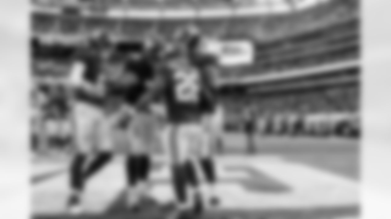 QB Jaxson Dart (6), G Greg Van Roten (74), RB Devin Singletary (26), G Austin Schlottmann (65)