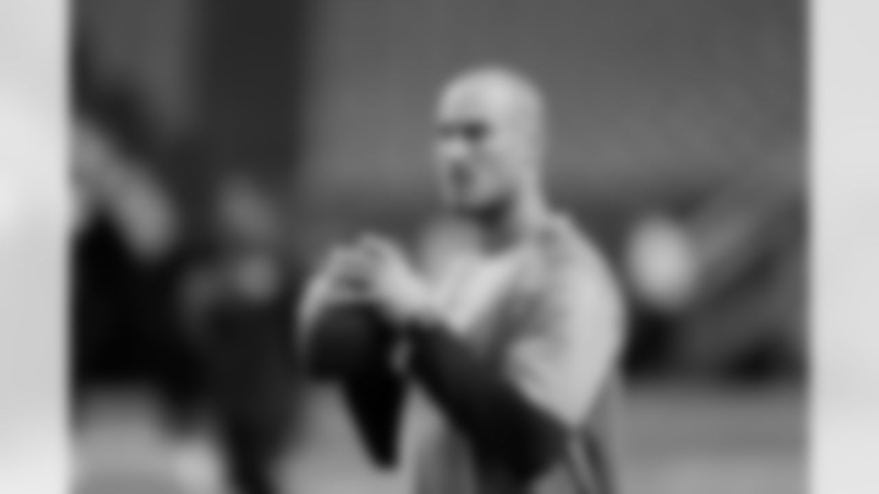 Jacksonville Jaguars' Mike Kafka works before  the first half of a preseason NFL football game against the Atlanta Falcons, Thursday, Aug. 29, 2013, in Atlanta. (AP Photo/Dave Martin)