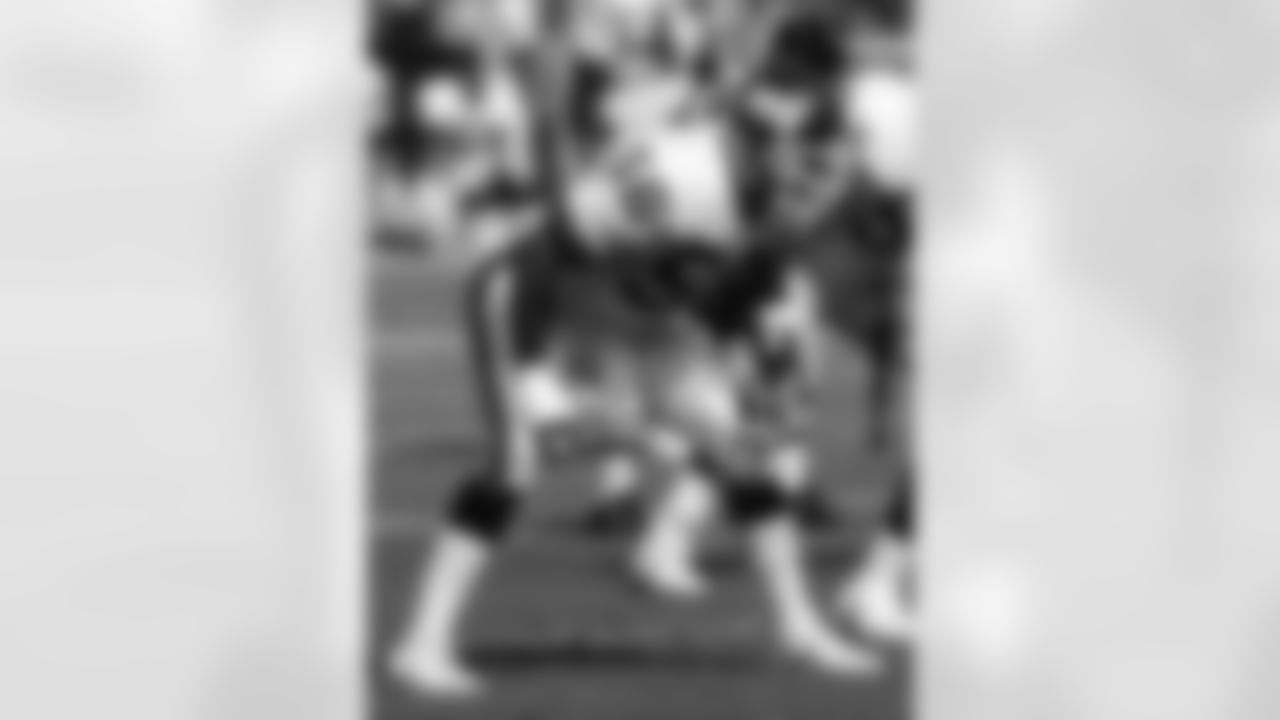 New York Giants linebacker Lawrence Taylor (56) looks into the opposing backfield during an NFL game against the Los Angeles Rams on October 18, 1992, at Anaheim Stadium in Anaheim, California. (AP Photo/Kevin Terrell)