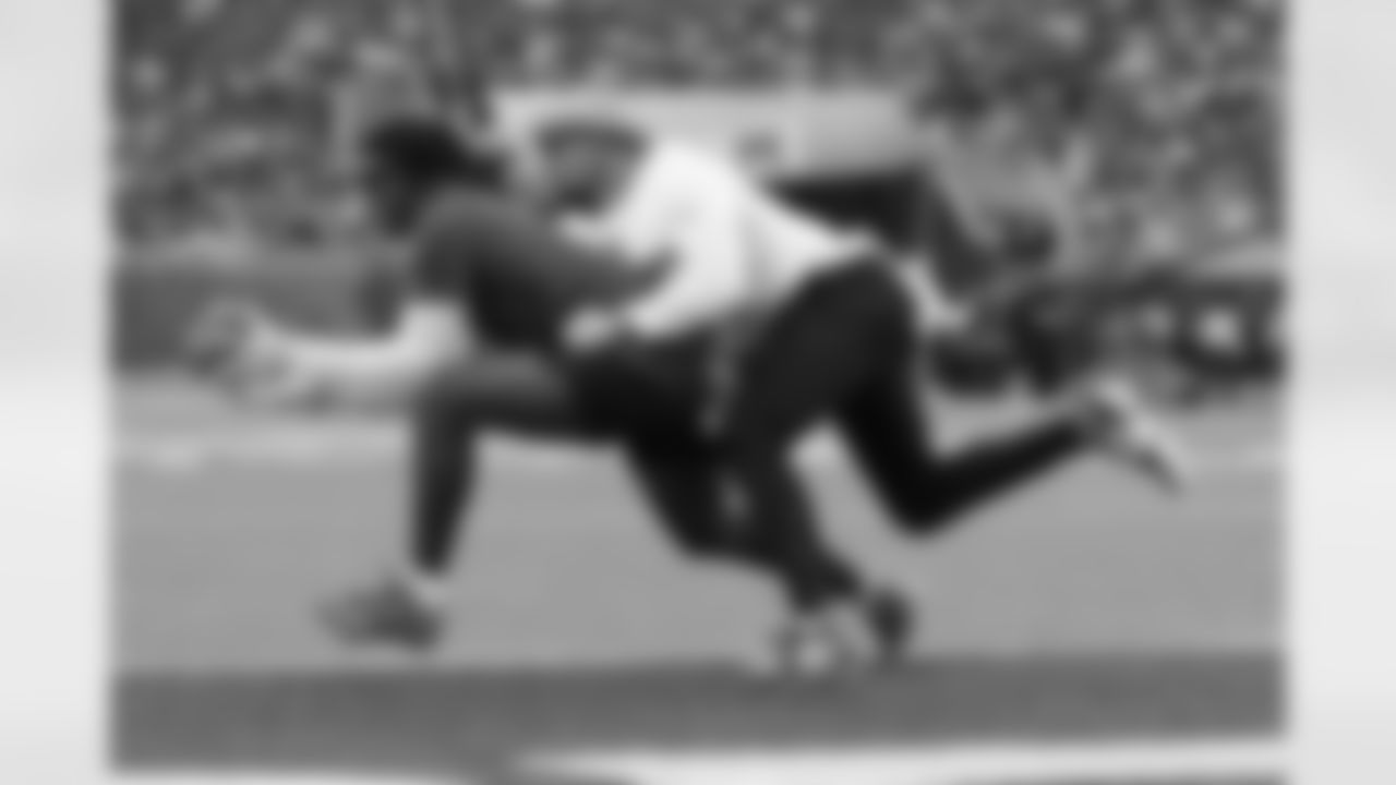 NFC wide receiver Malik Nabers (1) of the New York Giants makes a catch for a touchdown while defended by AFC free safety Minkah Fitzpatrick (39) of the Pittsburgh Steelers during the NFL Pro Bowl football game, Sunday, Feb. 2, 2025, in Orlando, Fla. (Perry Knotts via AP)