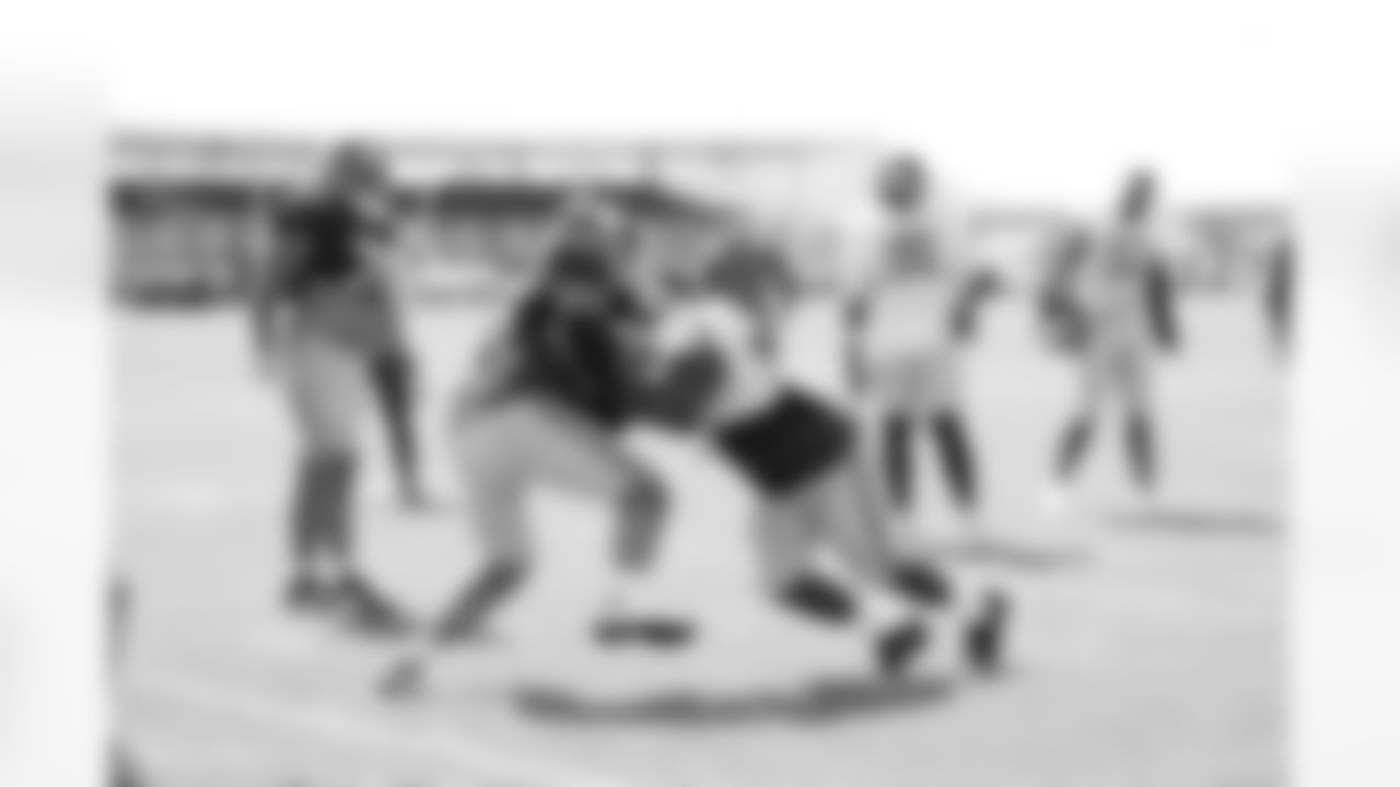 DT Elijah Chatman (94),G Jon Runyan Jr. (76)