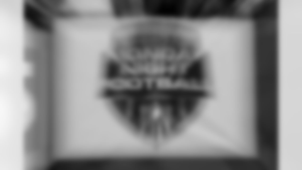 A Monday night football banner hangs from a wall in this zoom time exposure photograph taken during the New York Giants 2017 NFL week 2 regular season football game against the against the Detroit Lions, Monday, Sept. 18, 2017 in East Rutherford, N.J. The Lions won the game 24-10. (Paul Spinelli via AP)