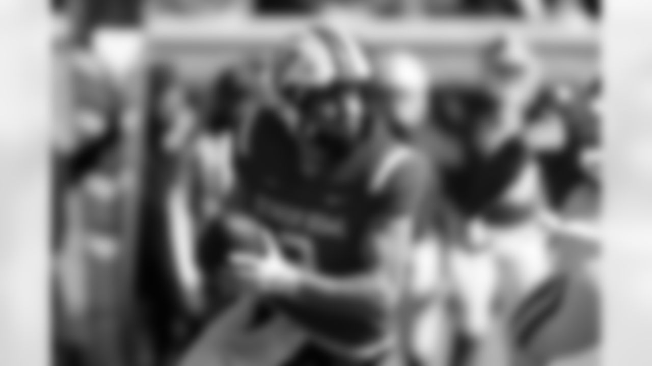 National Team quarterback Diego Pavia (2) of Vanderbilt, rolls out to pass during the first half of the Senior Bowl NCAA college football game Saturday, Jan. 31, 2026, in Mobile, Ala. (AP Photo/Butch Dill)