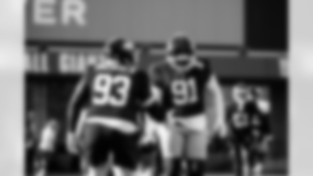 DT Darius Alexander (91) and DL Rakeem Nuñez-Roches (93)