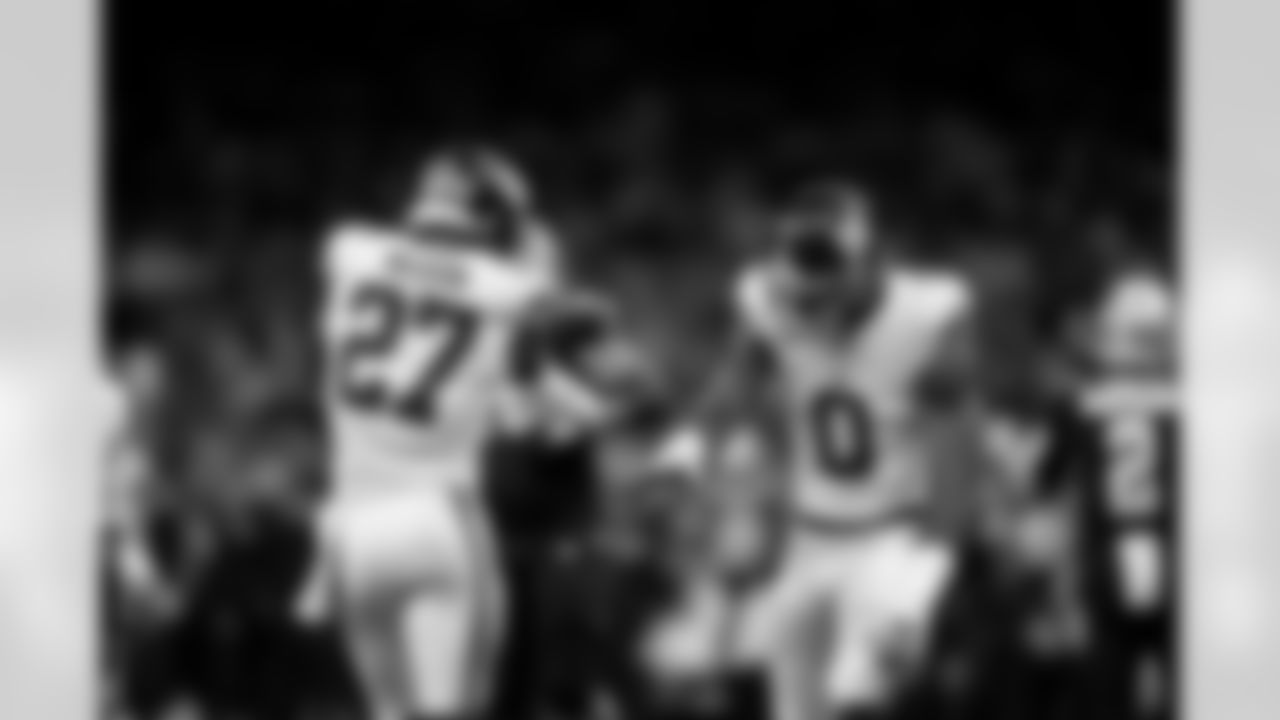 S Tyler Nubin (27) and OLB Brian Burns (0) celebrate during an NFL football game against the New Orleans Saints on Sunday, October 5, 2025 at Caesars Superdome in New Orleans. (BRENNAN ASPLEN/NEW YORK GIANTS)