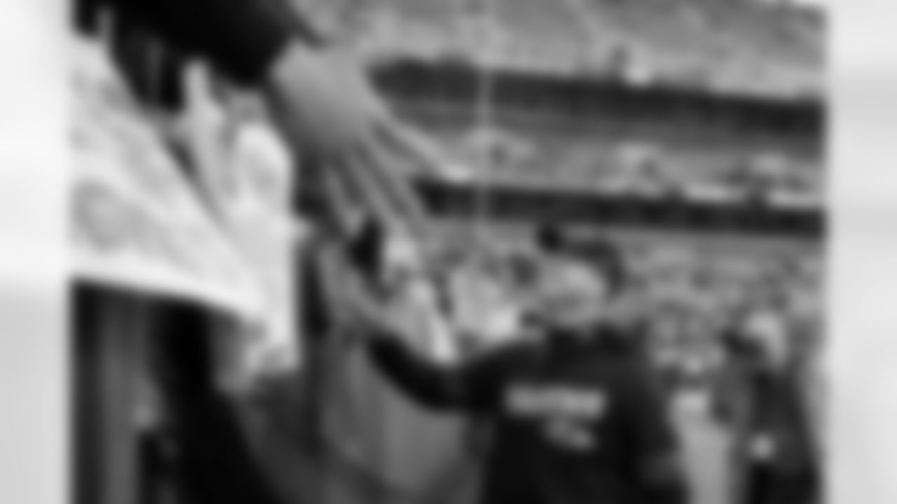 Baltimore Ravens head coach John Harbaugh celebrates with fans after the Ravens defeated the Cleveland Browns in an NFL football game, Sunday, Dec. 22, 2019, in Cleveland. (AP Photo/Ron Schwane)