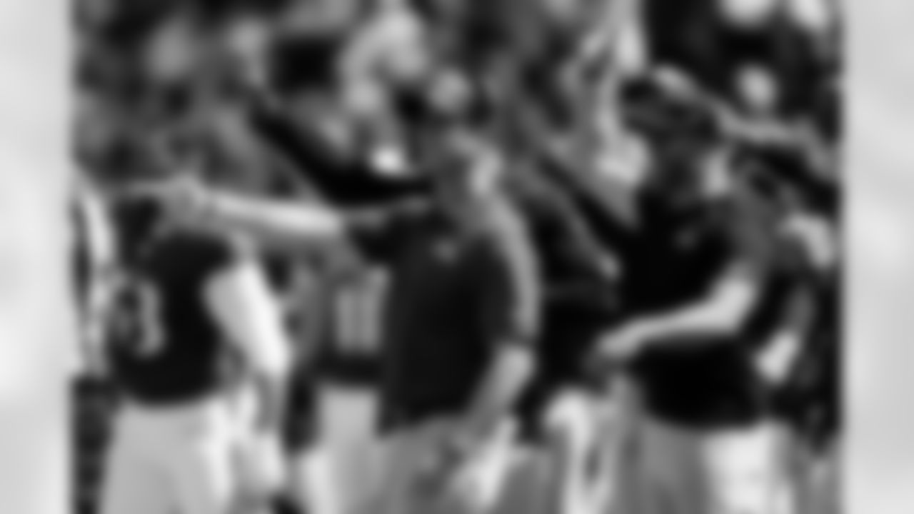 Baltimore Ravens head coach John Harbaugh motions towards the field during the first half of an NFL football game against the Las Vegas Raiders, Sunday, Sept. 15, 2024, in Baltimore. (AP Photo/Nick Wass)