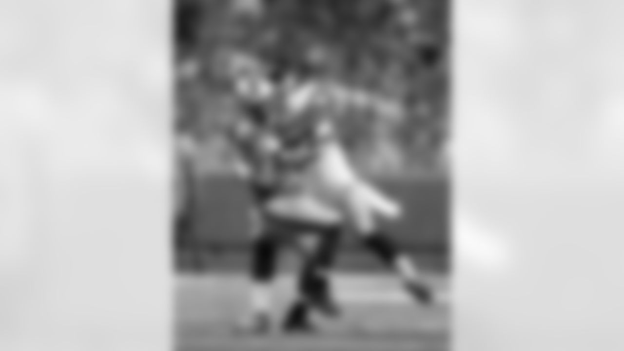 Detroit Lions wide receiver Golden Tate (15) is tackled during an NFL football game against the New York Giants at Ford Field on Monday, September 8, 2014 in Detroit, Michigan. Detroit won 35-14. (AP Photo/Aaron M. Sprecher)