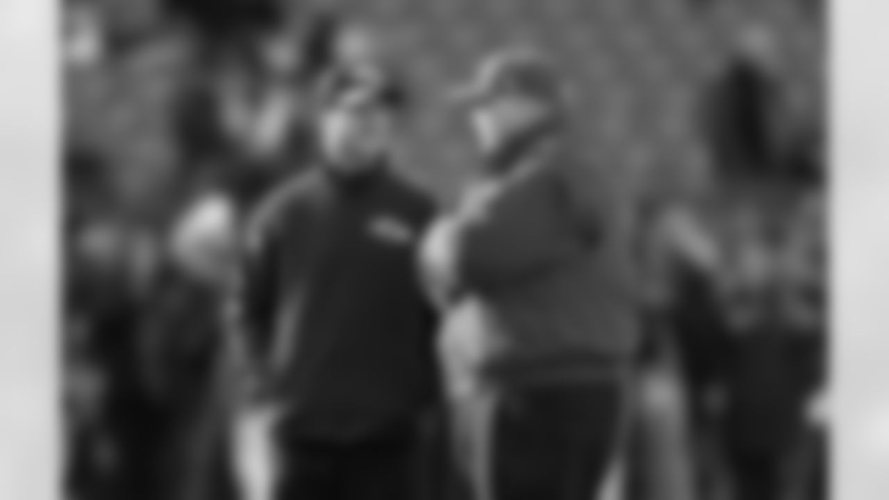 Baltimore Ravens head coach John Harbaugh, left, and Kansas City Chiefs head coach Andy Reid chat before an NFL football game, Sunday, Dec. 20, 2015, in Baltimore. (AP Photo/Gail Burton)