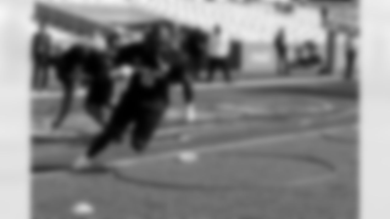 National team defensive lineman Darius Alexander of Toledo (9) runs through drills during practice for the Senior Bowl NCAA college football game, Wednesday, Jan. 29, 2025, in Mobile, Ala. (AP Photo/Butch Dill)