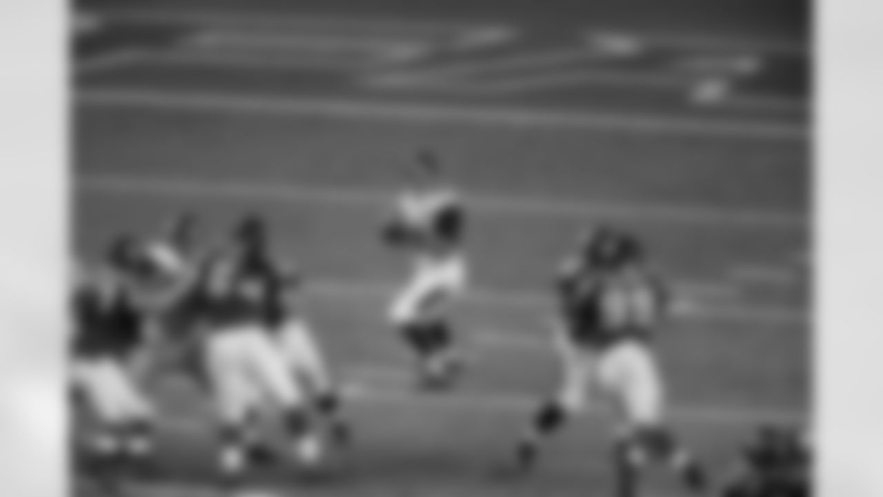 Jacksonville Jaguars quarterback Mike Kafka (3) works against the Atlanta Falcons during the second half of a preseason NFL football game, Thursday, Aug. 29, 2013, in Atlanta. (AP Photo/John Bazemore)