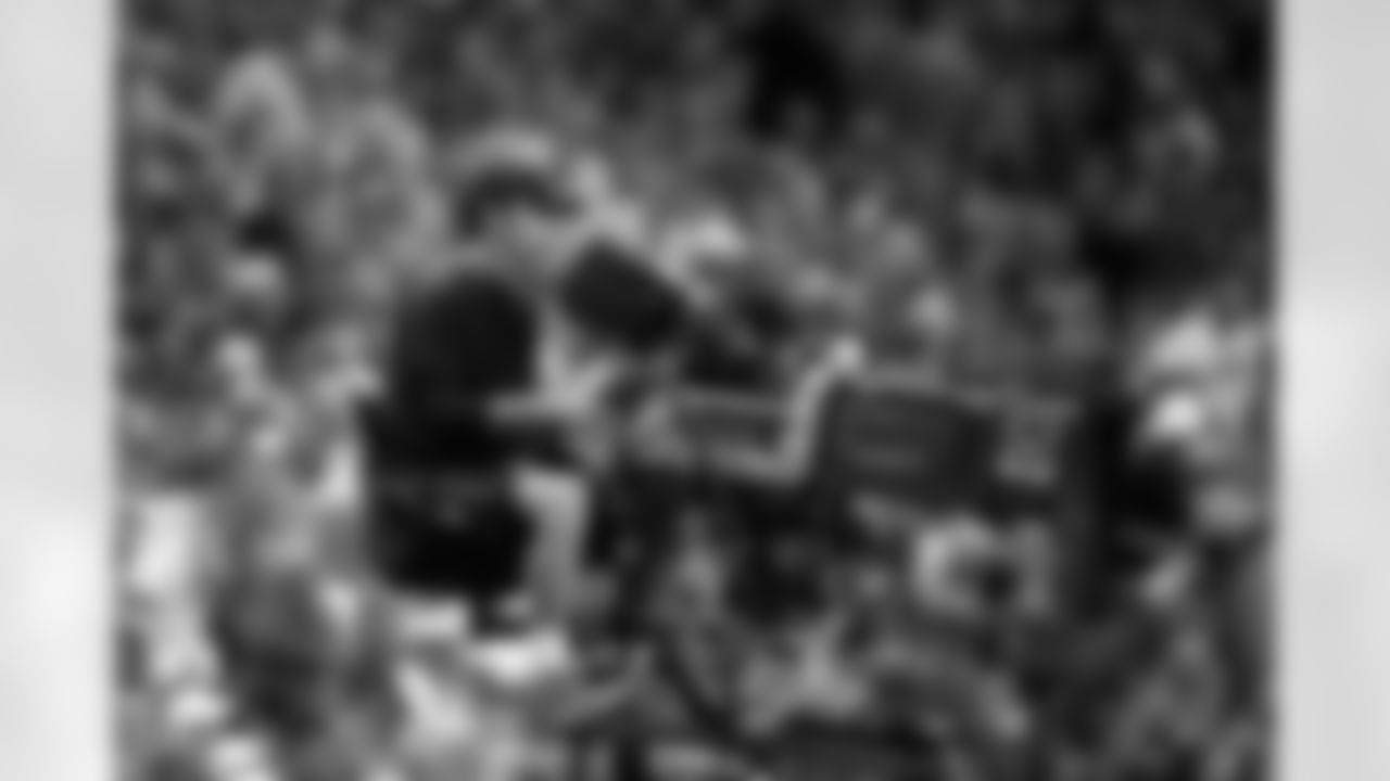 An ESPN camera man is seen during an NFL football game between the New York Giants and Detroit Lions at Ford Field on Monday, September 8, 2014 in Detroit, Michigan. Detroit won 35-14. (AP Photo/Aaron M. Sprecher)