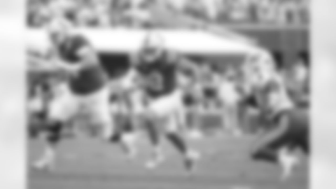 Mississippi quarterback Jaxson Dart (2) runs the ball during the first half of an NCAA college football game against Mercer in Oxford, Miss., Saturday, Sept. 2, 2023. (AP Photo/Thomas Graning)