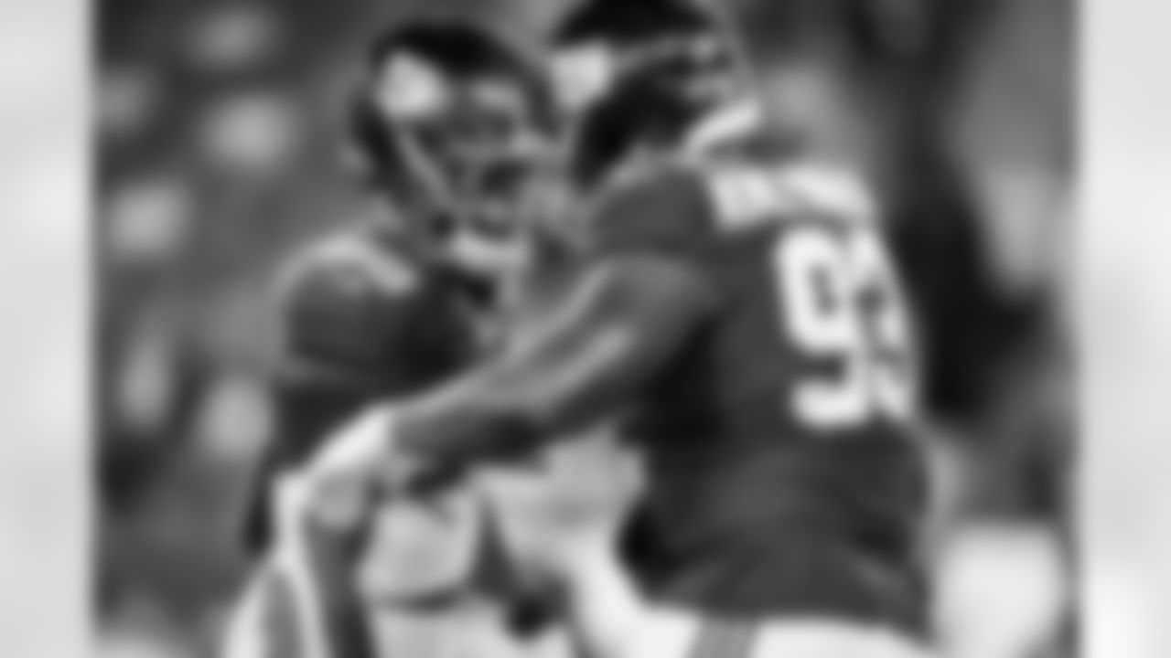 DL Rakeem Nuñez-Roches (93), RB Tyrone Tracy Jr. (29)