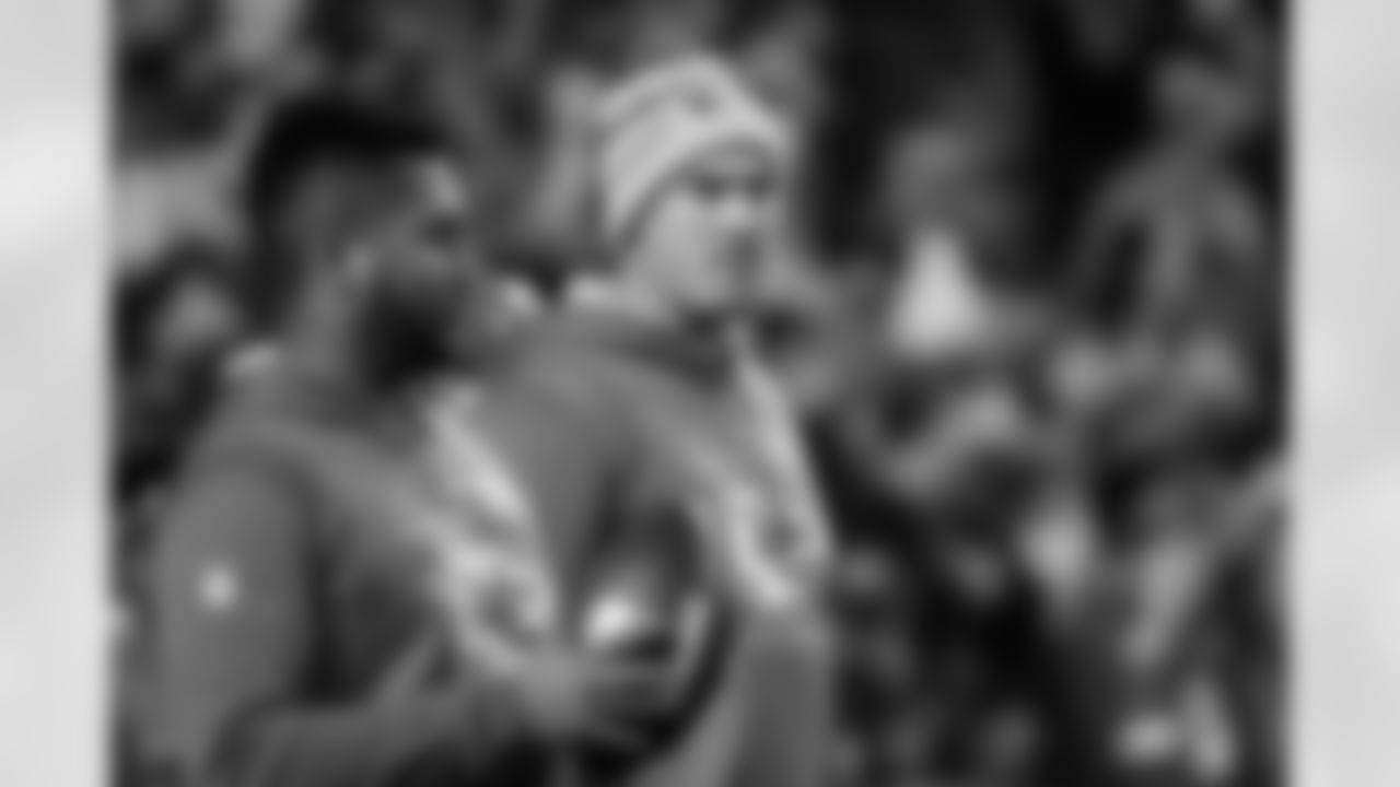 Kansas City Chiefs quarterbacks coach Mike Kafka, center, during pre-game warmups before an NFL football game against the Denver Broncos, Sunday, Dec. 5, 2021 in Kansas City, Mo. (AP Photo/Reed Hoffmann)