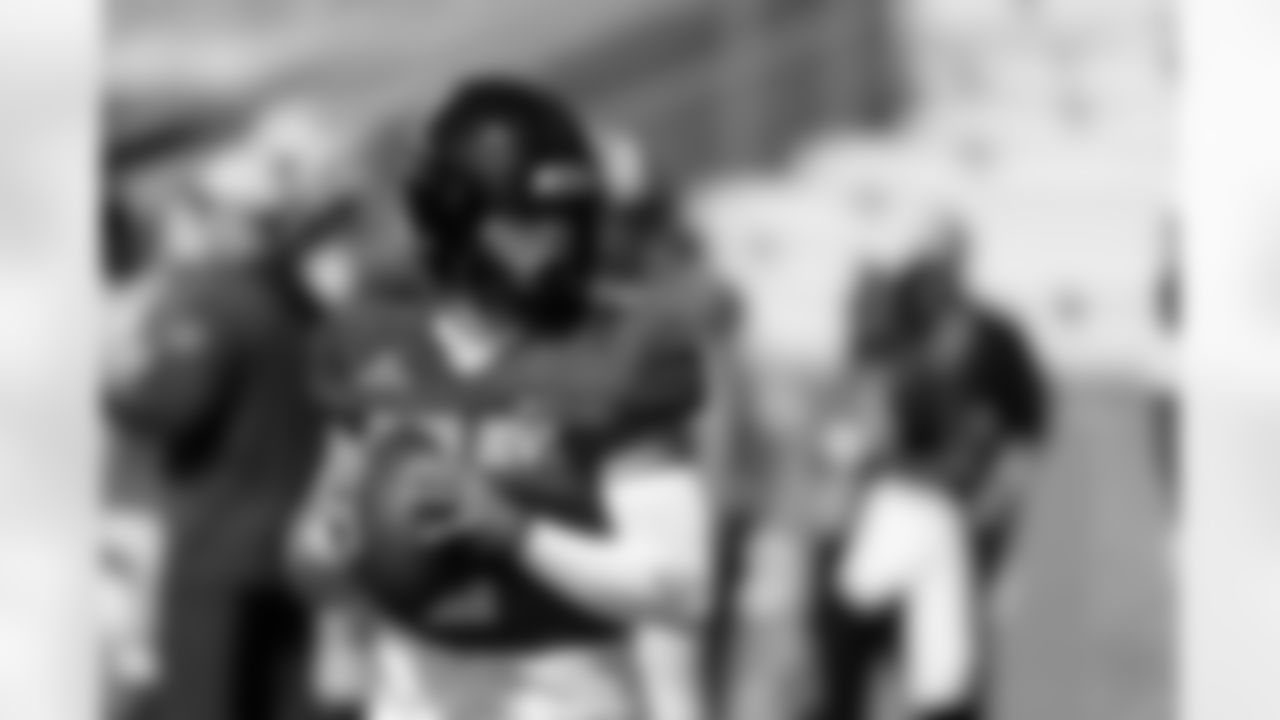 American team quarterback Jaxson Dart of Ole Miss (2) runs through drills during practice for the Senior Bowl NCAA college football game, Wednesday, Jan. 29, 2025, in Mobile, Ala. (AP Photo/Butch Dill)