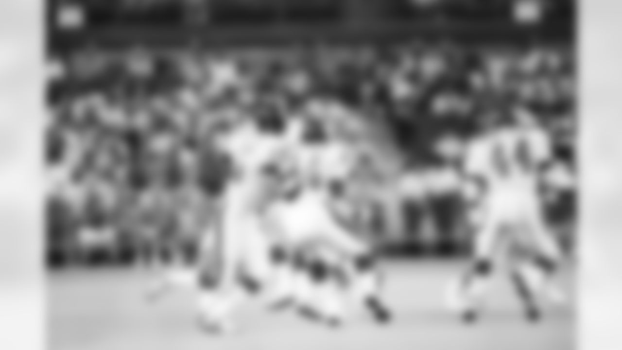 New York Giants quarterback Jeff Hostetler (15) in the first quarter in Houston Saturday, August 18, 1990. There was a 10 yard loss on the play. (AP Photo/Tim Johnson)