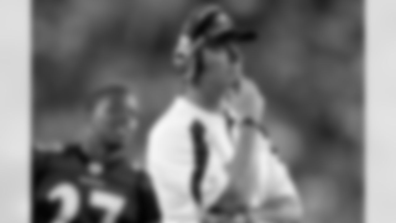 Baltimore Ravens head coach John Harbaugh watches his team in the second half of a preseason NFL football game with the Philadelphia Eagles Thursday, Aug. 11, 2011, in Philadelphia. (AP Photo/Matt Rourke)