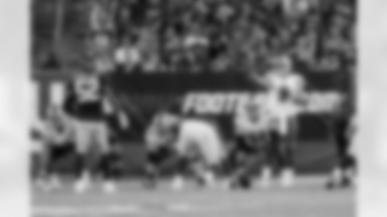 Detroit Lions quarterback Matthew Stafford (9) prepares for the snap from center Travis Swanson (64) during an NFL football game against the New York Giants on Monday, Sept. 18, 2017 in East Rutherford, N.J. Detroit won 24-10. (Aaron M. Sprecher via AP)