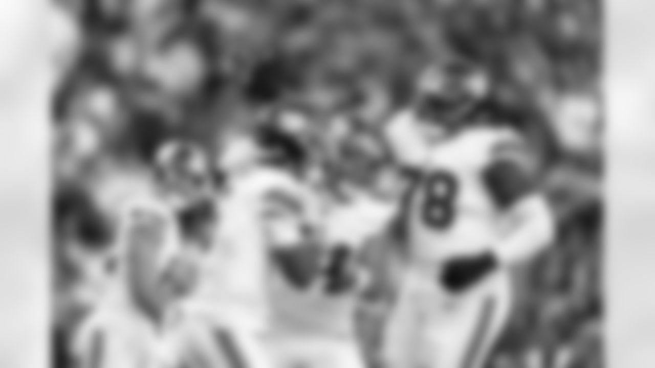 TE Theo Johnson (84), QB Jaxson Dart (6), T Andrew Thomas (78)