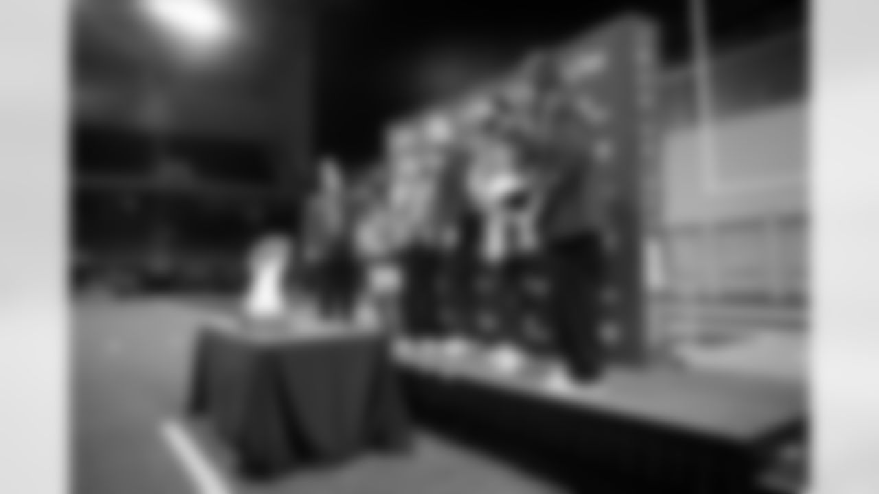 Ed Stolze, from left, of the Imperial Sirs, West's Frank Gore Jr., of Southern Miss, NFL Network reporter Jane Slater, West head coach Mike Kafka, of the New York Giants, West's Jarius Monroe, of Tulane and Matt Sturlaugson, Shriners Childrens Board of Directors, EWSB Committee Chairman, participate in the award ceremony after the East West Shrine Bowl NCAA college football game in Frisco, Texas, Thursday, Feb. 1, 2024. (AP Photo/Tony Gutierrez)