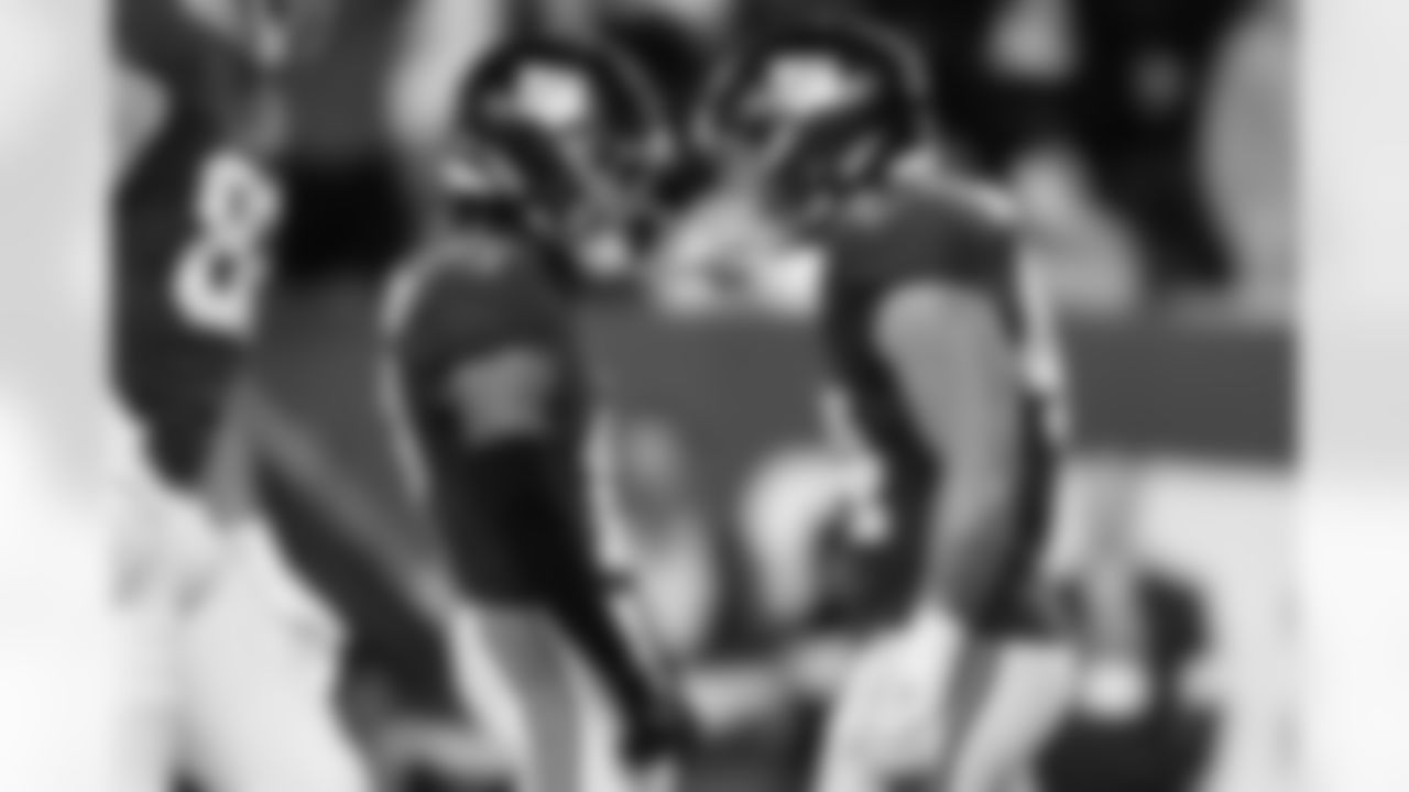 New York Giants wide receiver Wan'Dale Robinson (17) and running back Cam Skattebo (44) celebrate after a touchdown during an NFL football game against the Philadelphia Eagles, Thursday, Oct. 9, 2025 in East Rutherford, N.J. (Kathryn Riley via AP)