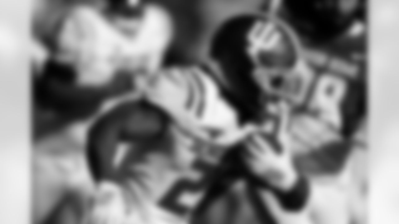 American Team running back Kaelon Black (26), of Indiana, carries the ball during the second half of the Senior Bowl NCAA college football game Saturday, Jan. 31, 2026, in Mobile, Ala. (AP Photo/Butch Dill)