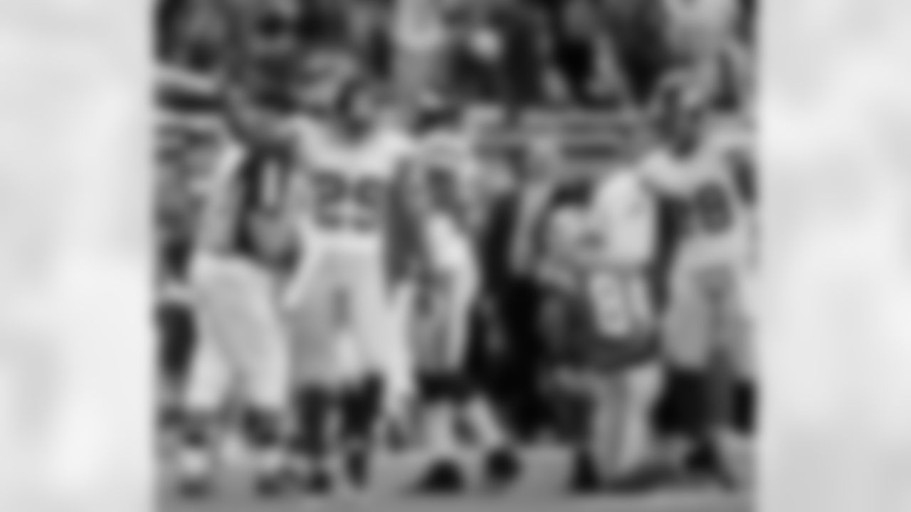 New York Giants cornerback Sam Madison (29) celebrates after intercepting a pass intended for Detroit Lions' Shaun McDonald (84) in the fourth quarter of an NFL football game in Detroit, Sunday, Nov. 18, 2007. New York won 16-10. (AP Photo/Paul Sancya)