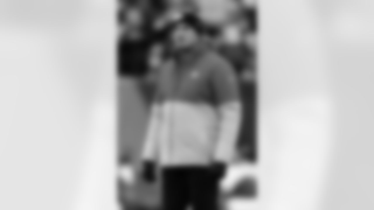 Kansas City Chiefs quarterback coach Mike Kafka watches warmups before an NFL football game against the Cincinnati Bengals, Sunday, Jan. 2, 2022, in Cincinnati. (AP Photo/Emilee Chinn)