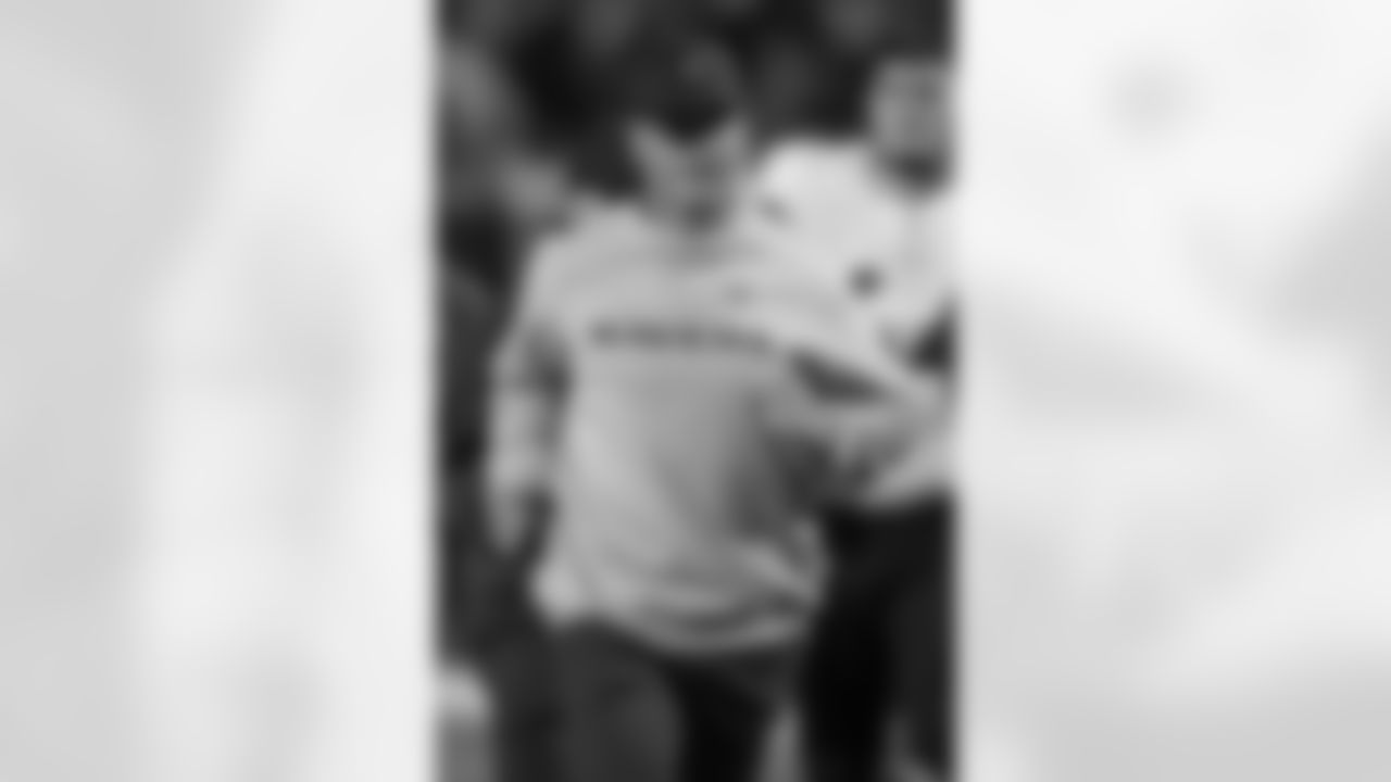 Baltimore Ravens head coach John Harbaugh runs off the field after the first half of an NFL football game against the Buffalo Bills in Orchard Park, N.Y., Sunday, Sept. 7, 2025. (AP Photo/Adrian Kraus)