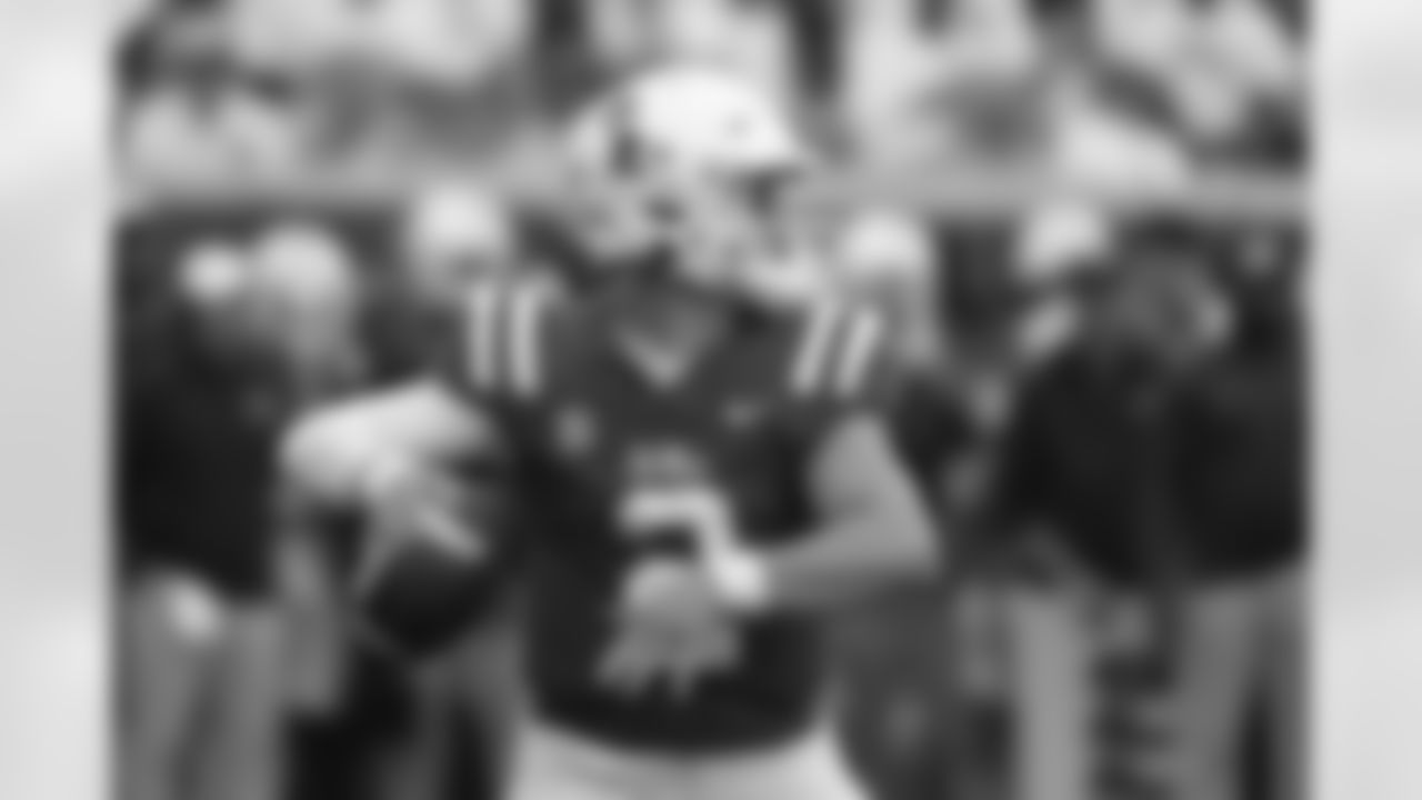Mississippi quarterback Jaxson Dart (2) looks pass during the first half of an NCAA college football game against Mercer in Oxford, Miss., Saturday, Sept. 2, 2023. (AP Photo/Thomas Graning)
